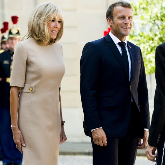 La première dame Brigitte Macron, le président Emmanuel Macron, Kyriakos Mitsotakis, premier ministre de la République Hellénique et sa femme Mareva Grabowski - Le président de la République française reçoit le premier ministre de la République Hellénique au palais de l'Elysée à Paris le 22 août 2019. © JB Autissier / Panoramic / Bestimage