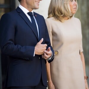 Le président Emmanuel Macron et la première dame Brigitte Macron - Le président de la République française reçoit le premier ministre de la République Hellénique au palais de l'Elysée à Paris le 22 août 2019. © JB Autissier / Panoramic / Bestimage