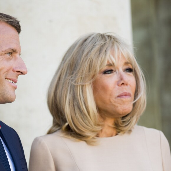 Le président Emmanuel Macron et la première dame Brigitte Macron - Le président de la République française reçoit le premier ministre de la République Hellénique au palais de l'Elysée à Paris le 22 août 2019. © JB Autissier / Panoramic / Bestimage