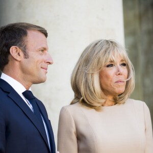 Le président Emmanuel Macron et la première dame Brigitte Macron - Le président de la République française reçoit le premier ministre de la République Hellénique au palais de l'Elysée à Paris le 22 août 2019. © JB Autissier / Panoramic / Bestimage