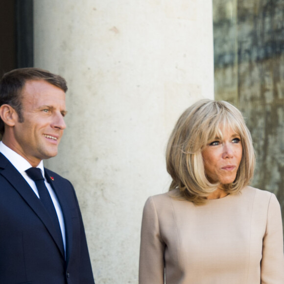 Le président Emmanuel Macron et la première dame Brigitte Macron - Le président de la République française reçoit le premier ministre de la République Hellénique au palais de l'Elysée à Paris le 22 août 2019. © JB Autissier / Panoramic / Bestimage