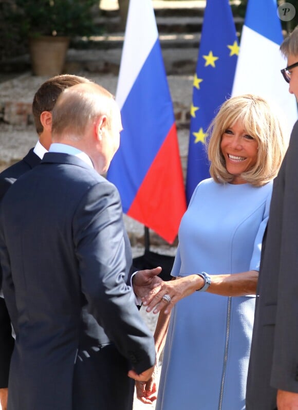 Le président Emmanuel Macron, la première dame Brigitte Macron, le président Vladimir Poutine - Le président de la République française reçoit le président de la fédération de Russie au fort de Brégançon le 19 août 2019. © Dominique Jacovides / Bestimage