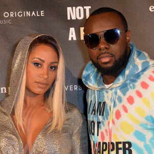 Le rappeur Gims (Maître Gims - Gandhi Djuna) et sa femme Demdem Djuna lors de la soirée de lancement de la collection capsule "I'm not a rapper" de la marque Elevenparis (Eleven Paris) à Paris, France, le 11 avril 2019. © Veeren/Bestimage