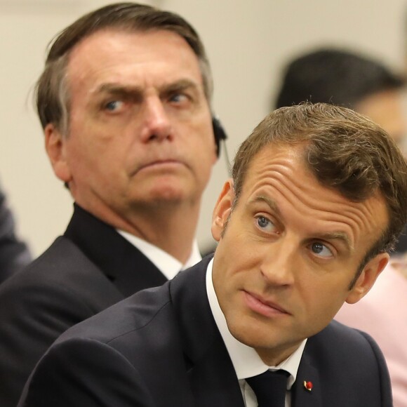 Emmanuel Macron (président de la République Française) et Jair Bolsonaro (président de la République fédérative du Brésil) - Evènement parallèle organisé par le Premier Ministre japonais, sur le thème "Promouvoir la place des femmes au travail" au centre de congrès Intex Osaka lors du sommet du G20 à Osaka, Japon, le 29 juin 2019. © Dominque Jacovides/Pool/Bestimage