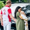 Le prince Harry, duc de Sussex, Meghan Markle, duchesse de Sussex, et leur fils Archie Mountbatten-Windsor lors d'un match de polo de bienfaisance à Wokinghan le 10 juillet 2019.
