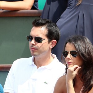 Maxime Chattam et Faustine Bollaert à Roland Garros, en 2012. 