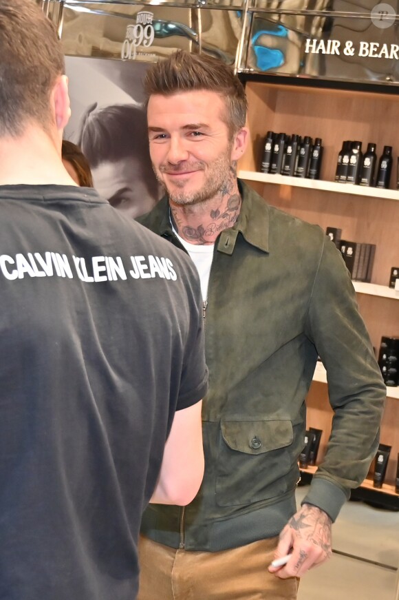 David Beckham fait la promotion de ses produits cosmétiques pour hommes House 99 (soins pour le visage, la barbe, le corps et les cheveux) dans la boutique éphémère le de House 99 aux Galeries Lafayette Champs-Élysées, à Paris, France, le 21 mai 2019.