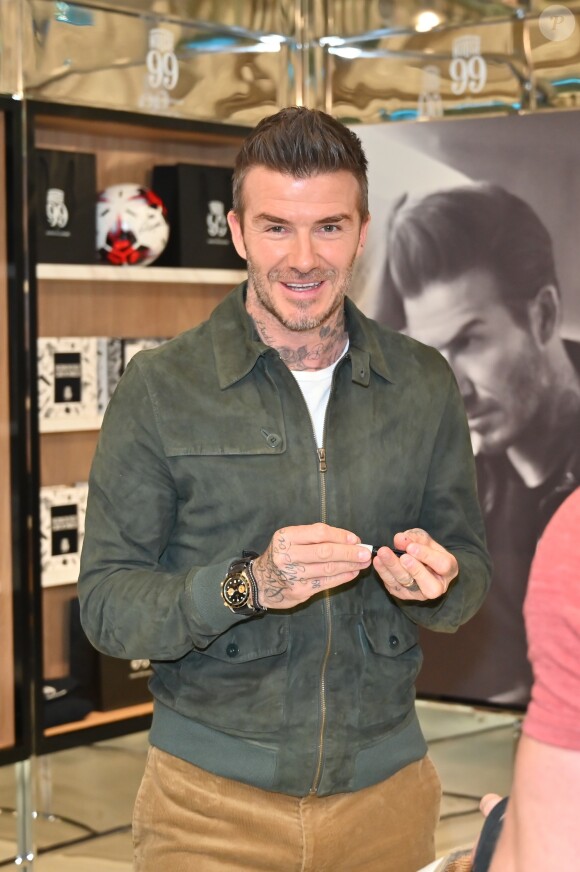 David Beckham fait la promotion de ses produits cosmétiques pour hommes House 99 (soins pour le visage, la barbe, le corps et les cheveux) dans la boutique éphémère le de House 99 aux Galeries Lafayette Champs-Élysées, à Paris, France, le 21 mai 2019.