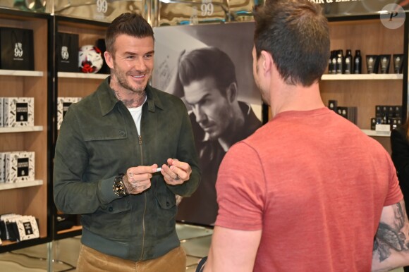 David Beckham fait la promotion de ses produits cosmétiques pour hommes House 99 (soins pour le visage, la barbe, le corps et les cheveux) dans la boutique éphémère le de House 99 aux Galeries Lafayette Champs-Élysées, à Paris, France, le 21 mai 2019.