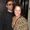Liam Gallagher et Debbie Gwyther avec un ami à la sortie du restaurant "Scott's" à Londres, le 8 août 2018.