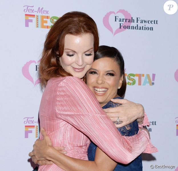 Marcia Cross et Eva Longoria au photocall du gala caritatif "Farrah Fawcett Foundation" au Wallis Annenberg Center for the Performing Arts à Los Angeles, le 6 septembre 2019.