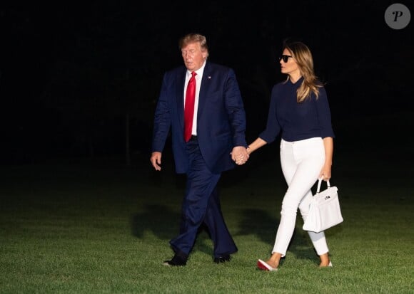 Donald Trump et Melania Trump de retour à la Maison Blanche à Washington, de retour de Biarritz (France) où le président américain a participé au sommet du G7. Washington. Le 26 août 2019.