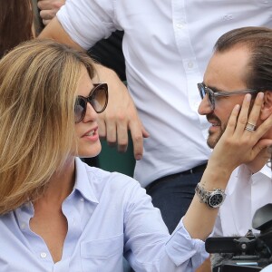 Cyril Lignac et sa nouvelle compagne Marine dans les tribunes des Internationaux de France de Tennis de Roland Garros à Paris, le 10 juin 2018. © Dominique Jacovides - Cyril Moreau/Bestimage