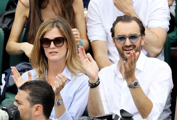 Cyril Lignac et sa nouvelle compagne Marine dans les tribunes des Internationaux de France de Tennis de Roland Garros à Paris, le 10 juin 2018. © Dominique Jacovides - Cyril Moreau/Bestimage