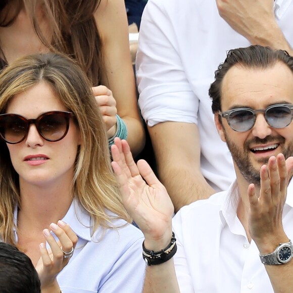 Cyril Lignac et sa nouvelle compagne Marine dans les tribunes des Internationaux de France de Tennis de Roland Garros à Paris, le 10 juin 2018. © Dominique Jacovides - Cyril Moreau/Bestimage