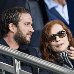 Isabelle Huppert et son fils Lorenzo Chammah dans les tribunes lors du match UEFA Ligue des Champions groupe A, opposant le Paris Saint-Germain (PSG) au Real Madrid au Parc des Princes à Paris, France, le 18 septembre 2019. Le PSG a gagné 3-0. © Cyril Moreau/Bestimage