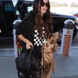 Megan Fox arrive seule à l'aéroport de LAX à Los Angeles pour prendre l'avion, le 26 novembre 2018