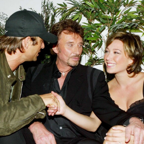Johnny et ses enfants David Hallyday et Laura Smet en 2003.