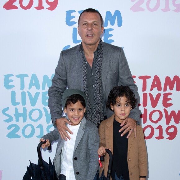 Jean-Roch et ses jumeaux Santo et Cielo assistent à l'Etam Live Show 2019 au Stade Roland Garros à Paris le 24 septembre 2019. © Rachid Bellak / Bestimage
