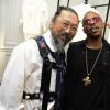 Takashi Murakami et Lil Buck assistent au vernissage de l'exposition "A Tribute to Karl Lagerfeld: The White Shirt Project". Paris, le 25 septembre 2019.