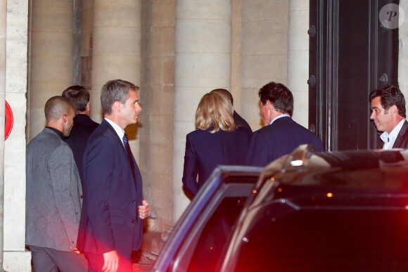 Le président Emmanuel Macron et sa femme Brigitte arrivent au domicile de Jacques Chirac à Paris le 26 septembre 2019.
