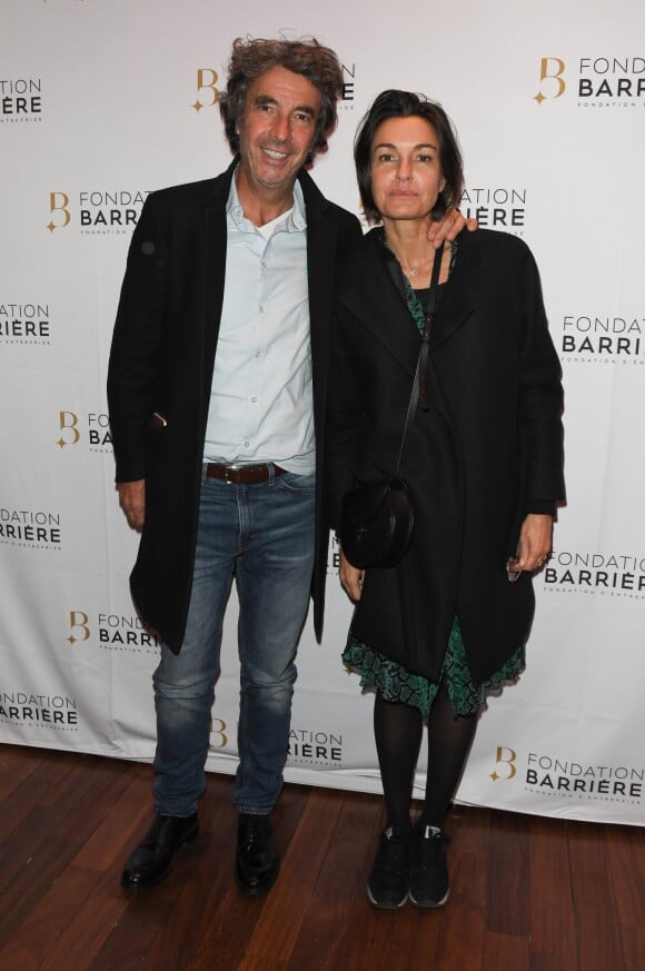 Eric Lavaine et sa compagne - Remise du prix Cinéma 2019 de la Fondation Barrière pour le film "Les Eblouis" au Publicis Cinémas à Paris le 7 Octobre 2019. © Coadic Guirec/Bestimage