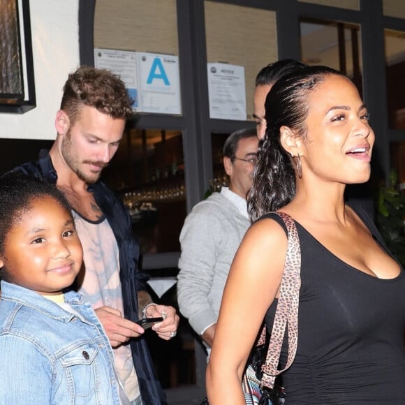 Christina Milian, enceinte, son compagnon Matt Pokora et sa fille Violet Madison sont allés dîner dans le restaurant Madeo à Beverly Hills, le 8 août 2019. Veuillez flouter le visage des enfants avant publication.  Pregnant Christina Milian shows off her growing baby bump in a black dress as she steps out after dinner at Madeo in Beverly Hills with her daughter Violet and boyfriend Matt Pokora on August 8th, 2019. Please hide children face prior publication.08/08/2019 - Los Angeles