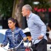 Exclusif - Le musicien Flea et sa compagne Melody Eshani se baladent en vélo dans les rues de New York, le 5 aout 2019.