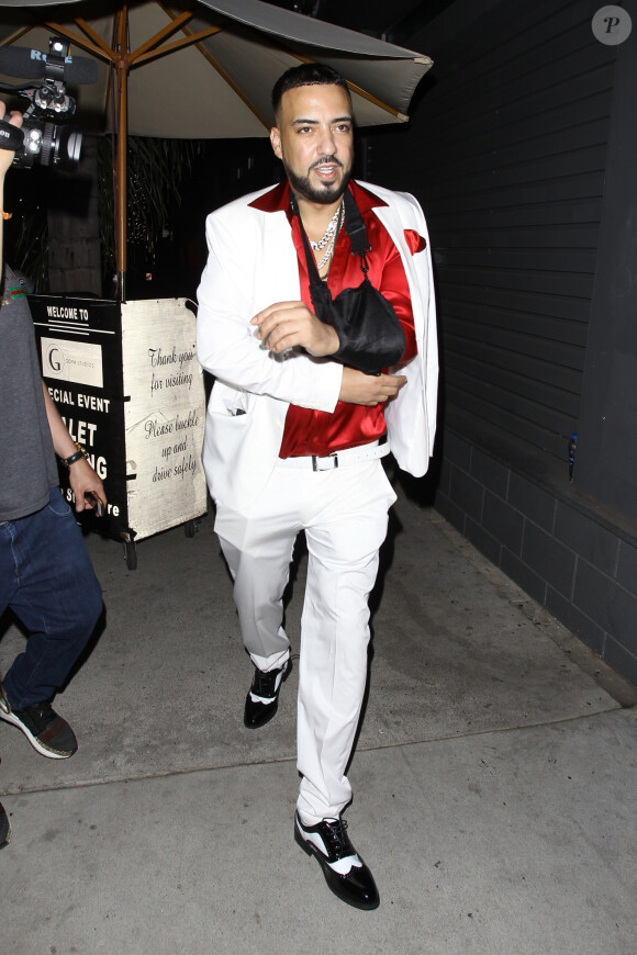French Montana arrive à l'anniversaire de Drake et montre aux photographes le cadeau qu'il lui offre. Selon lui, il vaut 175 000 dollars! Los Angeles, le 24 octobre 2019.24/10/2019 - Los Angeles