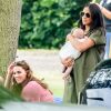 Meghan Markle, duchesse de Sussex, son fils Archie Harrison Mountbatten-Windsor et Catherine (Kate) Middleton, duchesse de Cambridge lors d'un match de polo de bienfaisance King Power Royal Charity Polo Day à Wokinghan, comté de Berkshire, Royaume Uni, le 10 juillet 2019.