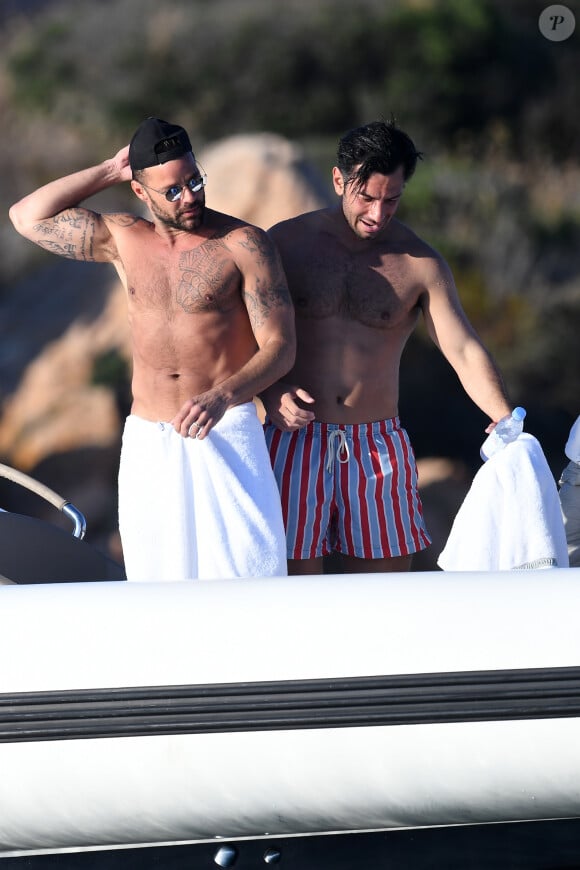 Ricky Martin et son mari Jwan Yosef en vacances sur un yacht avec des amis à Porto Cervo en Italie, le 12 août 2018. L