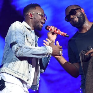 Dadju et son frère Maitre Gims en concert au Stade de France à Saint-Denis le 28 septembre 2019. © Giancarlo Gorassini / Bestimage