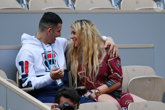 Exclusif - Marion Bartoli et son nouveau compagnon le joueur de football belge Yahya Boumediene s'embrassent dans les tribunes des Internationaux de France de Tennis de Roland Garros à Paris. 22 Mai 2019.