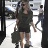 Fergie et son mari Josh Duhamel arrivent à l'aéroport LAX de Los Angeles, Californie, Etats-Unis, le 29 décembre 2016.