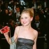 Kirsten Dunst (Judy Shepherd, dans "Jumanji") - Montée des marches pour le film "Haute Voltige". 52e Festival de Cannes. Le 14 mai 1999.
