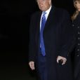 Le président Donald Trump et sa femme Melania arrivent à la Maison Blanche à Washington après un déplacement à Dover le 21 novembre 2019.
