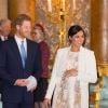 Meghan Markle (en robe brocard et manteau Amanda Wakely) avec le prince Harry - La famille royale d'Angleterre lors de la réception pour les 50 ans de l'investiture du prince de Galles au palais Buckingham à Londres. Le 5 mars 2019