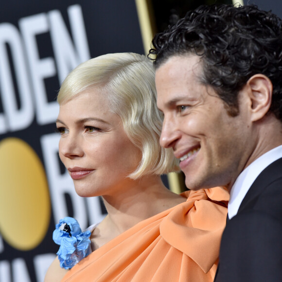 Michelle Williams enceinte et son fiancé Thomas Kail - Photocall de la 77e cérémonie annuelle des Golden Globe Awards au Beverly Hilton Hotel à Los Angeles, le 5 janvier 2020.