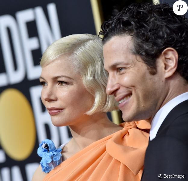 Michelle Williams enceinte et son fiancé Thomas Kail - Photocall de la 77e cérémonie annuelle des Golden Globe Awards au Beverly Hilton Hotel à Los Angeles, le 5 janvier 2020.