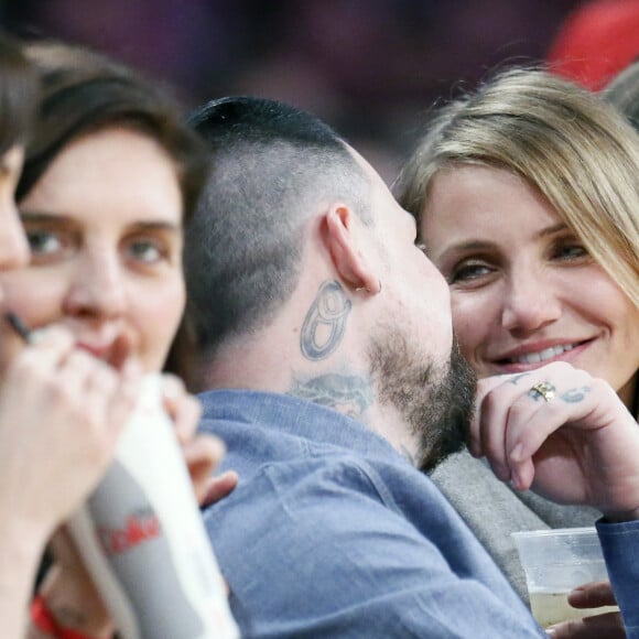 Cameron Diaz et son mari Benji Madden à un match de basket à Los Angeles en 2015.