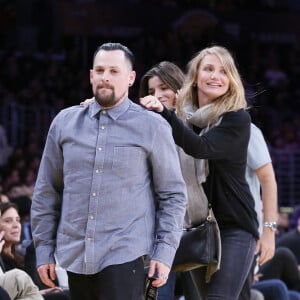 Cameron Diaz et son mari Benji Madden à un match de basket à Los Angeles en 2015.