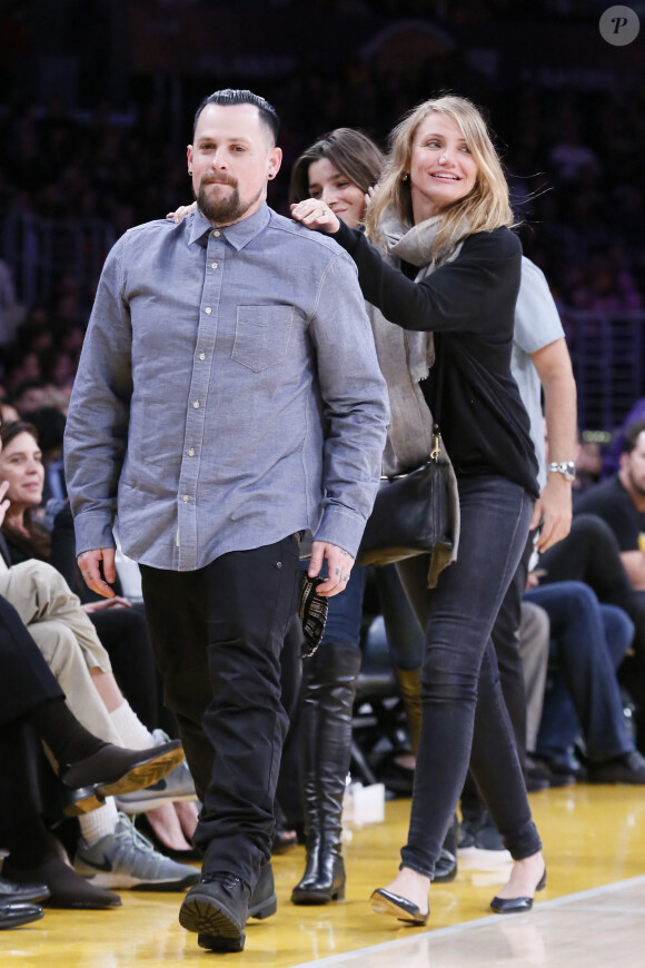 Cameron Diaz et son mari Benji Madden à un match de basket à Los Angeles en 2015.