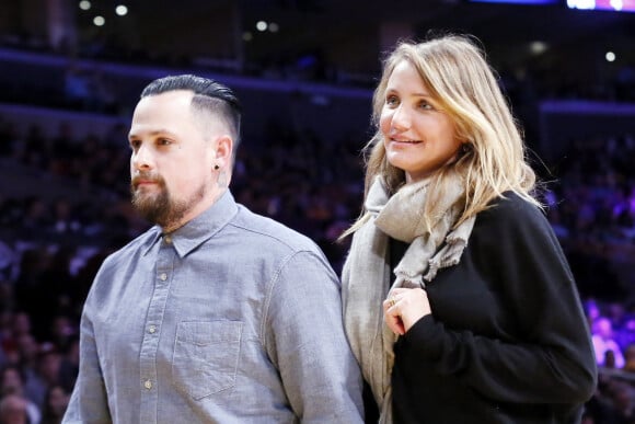 Cameron Diaz et son mari Benji Madden à un match de basket à Los Angeles en 2015.