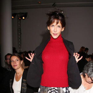 Sophie Marceau au defile de mode "Agnes B" pret-a-porter printemps-ete 2013 a Paris. Le 2 octobre 2013