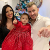 Julia Paredes, son chéri Maxime et leur fille Luna réunis pour leur premier Noël à trois, le 24 décembre 2018.