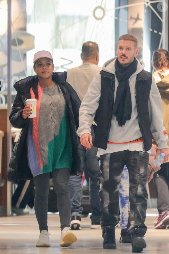 Exclusif - M. Pokora et sa compagne Christina Milian (enceinte) prennent un vol pour Genève à l'aéroport Roissy CDG le 13 novembre 2019