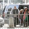 Exclusif - Violet, la fille de Christina Milian - M. Pokora et sa compagne Christina Milian (enceinte) prennent un vol pour Genève à l'aéroport Roissy CDG le 13 novembre 2019.