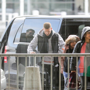 Exclusif - Violet, la fille de Christina Milian - M. Pokora et sa compagne Christina Milian (enceinte) prennent un vol pour Genève à l'aéroport Roissy CDG le 13 novembre 2019.