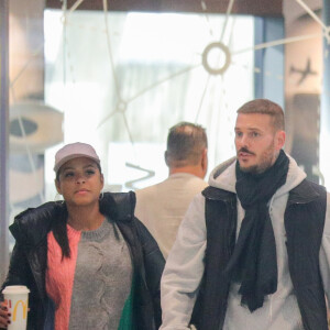 Exclusif - M. Pokora et sa compagne Christina Milian (enceinte) prennent un vol pour Genève à l'aéroport Roissy CDG le 13 novembre 2019.