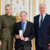 Le prince Albert et son épouse Charlene ont remis à Monsieur Jean Todt, Président de la Fédération Internationale d'Automobile, la distinction de Commandeur dans l'Ordre de Saint-Charles, le 26 janvier 2020 au palais princier. 